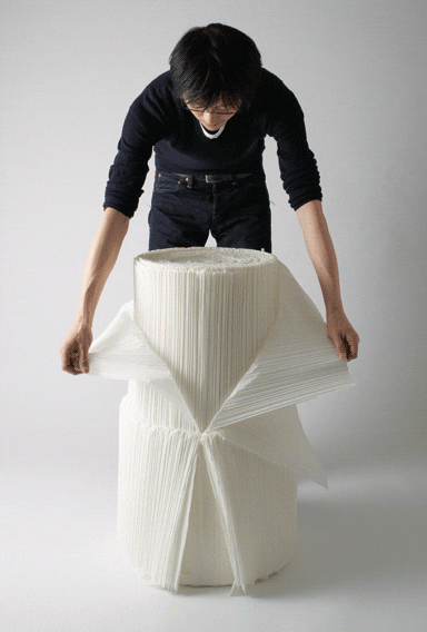 The sheets are then peeled away and folded down one by one The sheets are then peeled away and folded down one by one