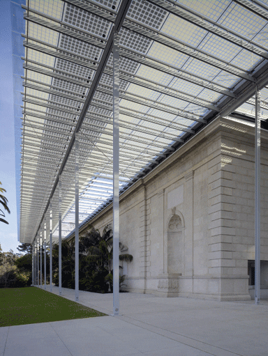 The solar canopy covers the preserved neoclassical facade of the old headquarters The solar canopy covers the preserved neoclassical facade of the old headquarters