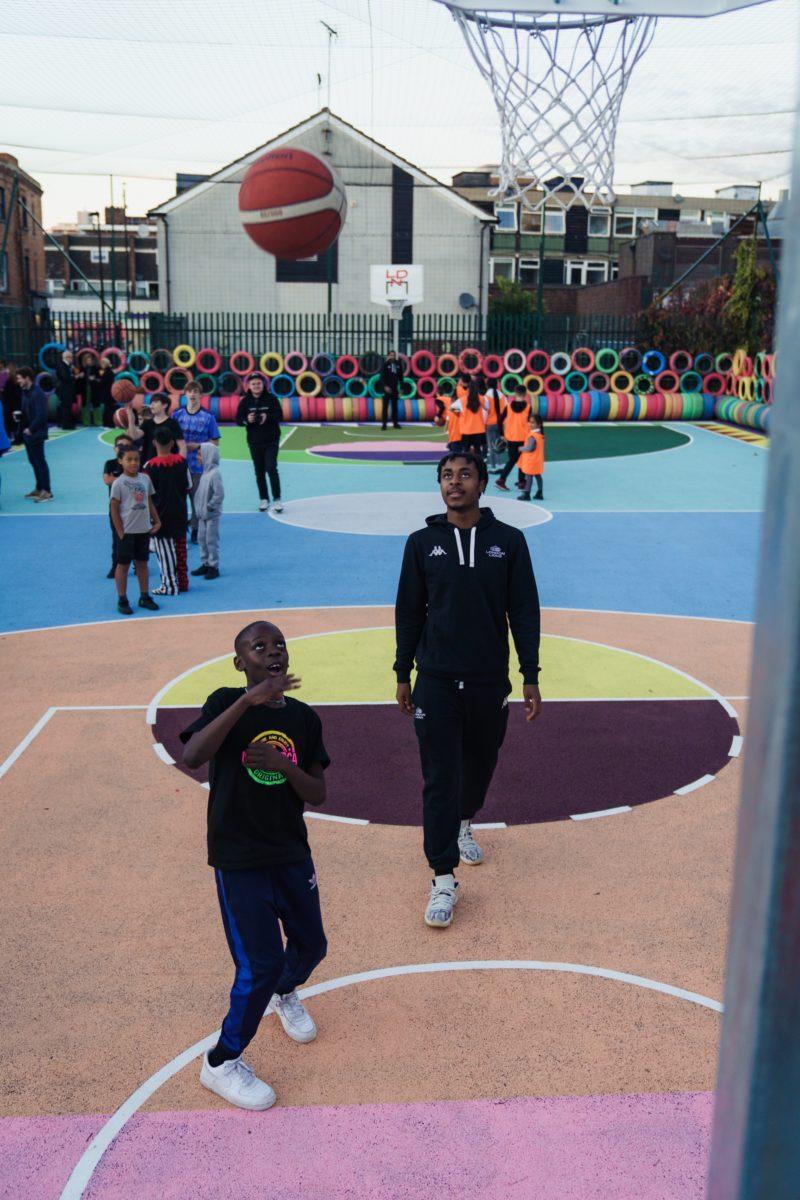 Alvaro Barrington basketball court Bethnal Green London kids playing
