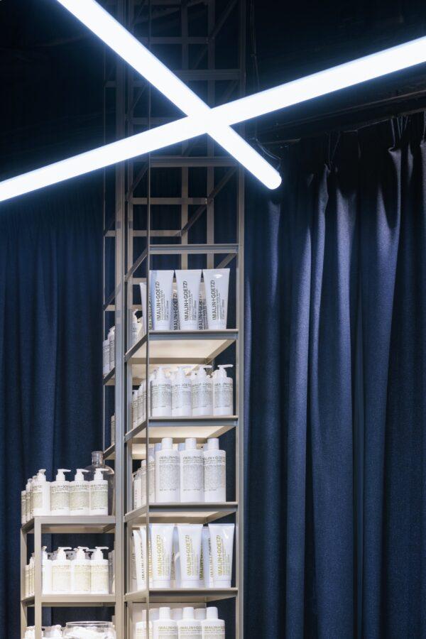 Jonathan Tuckey Design Malin Goetz Canary Wharf London navy interior 