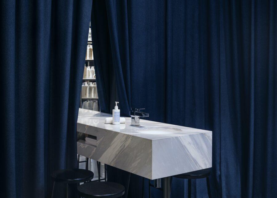 Jonathan Tuckey Design Malin Goetz Canary Wharf London navy interior
